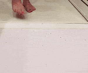 Color changing bath mat blood colored