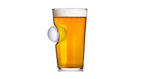 Beer glass with embedded golf ball